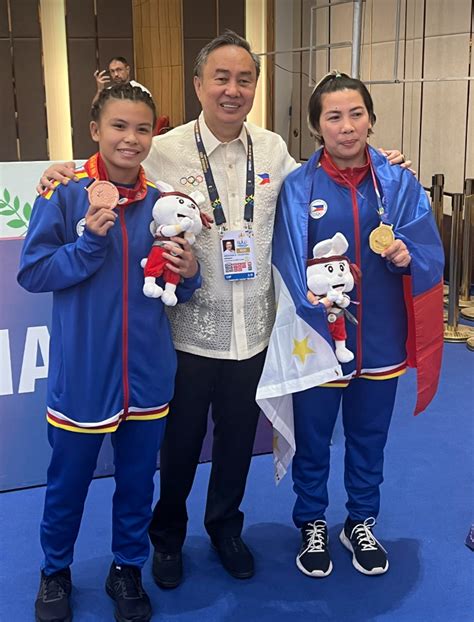 Wrestler. Mother. Champion: SEA Games gold medalist Cristina .